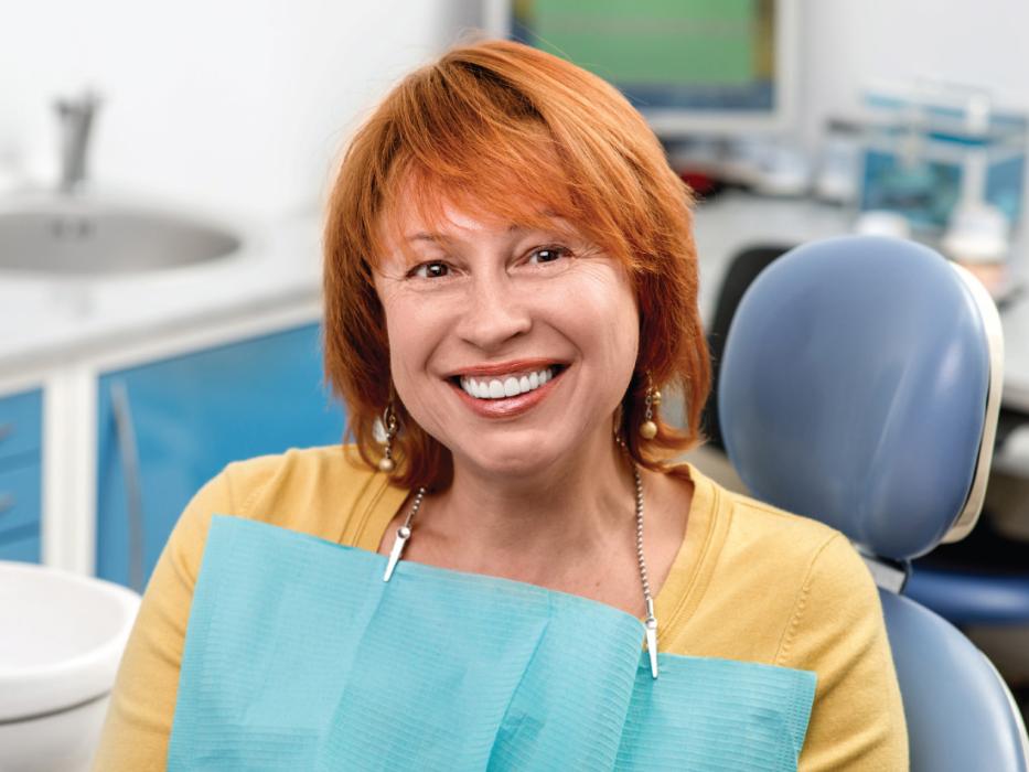 woman sitting in a dental chair