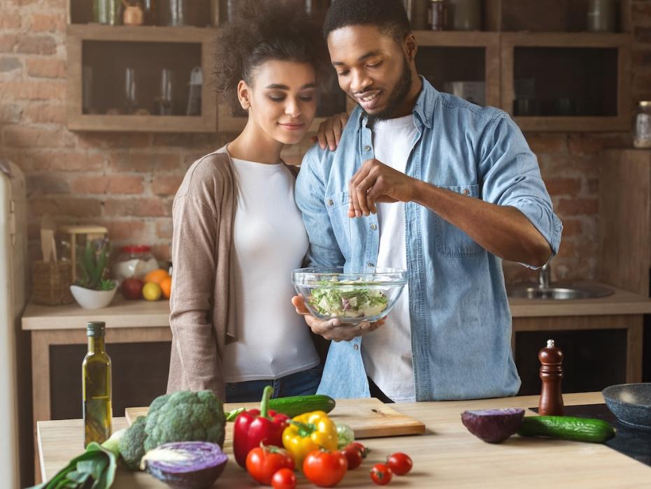 couple making salad