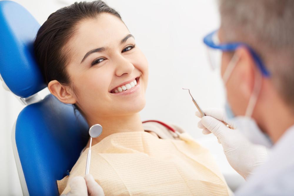 woman smiling after dental cleaning in blacktown