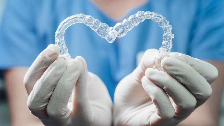 2 Invisalign forming a heart
