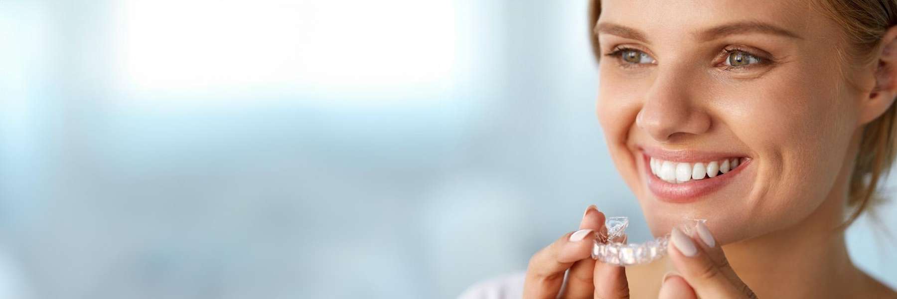 woman putting in invisalign in blacktown nsw