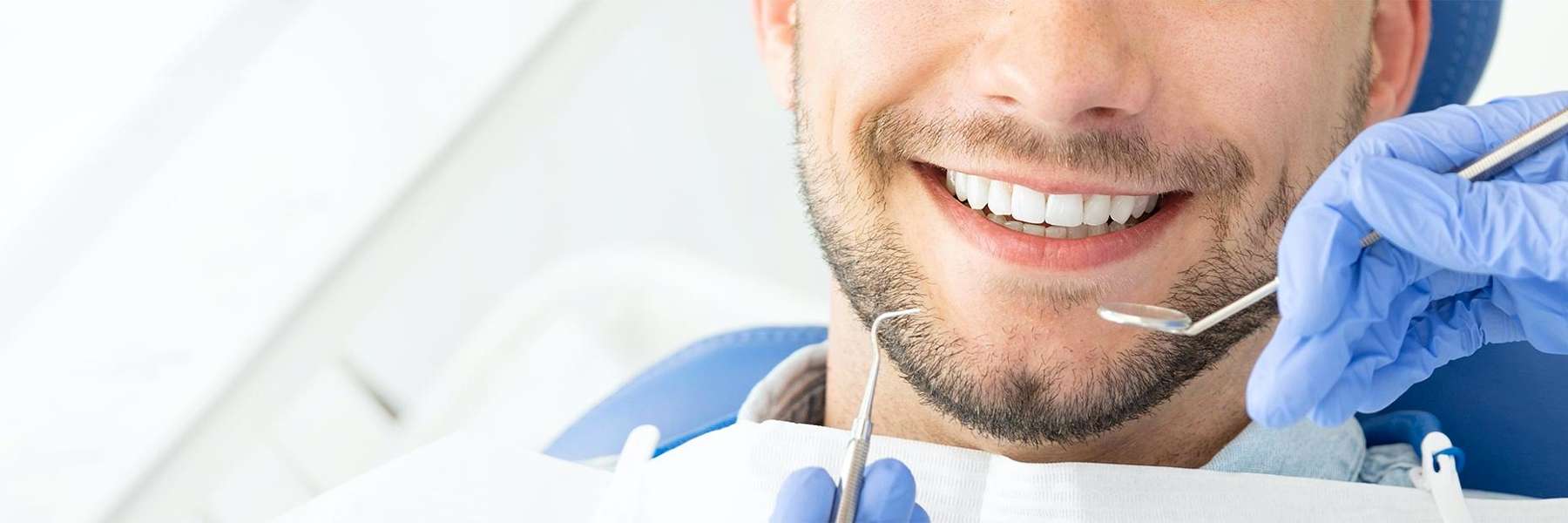 close up of man smiling after implant in Blacktown